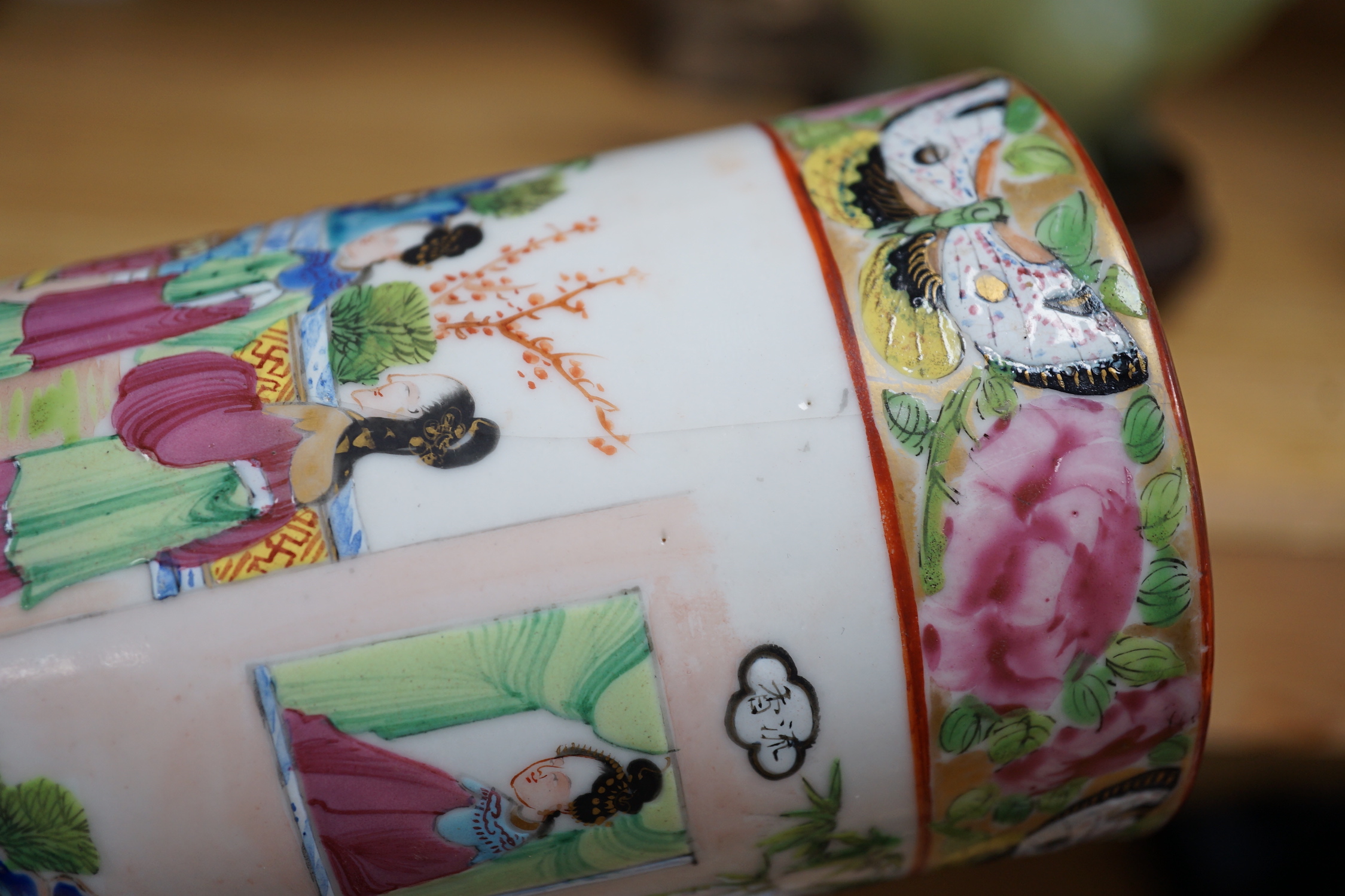 A pair of 19th century Cantonese famille rose porcelain brushpots, decorated with figural scenes, together with a further pair of Japanese export vases (4)